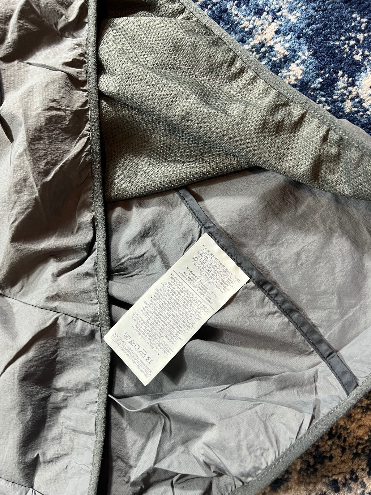 Nike Stride Dri Fit Windrunner Jacket – Black, Men's Large in Black, men's Large – detail view