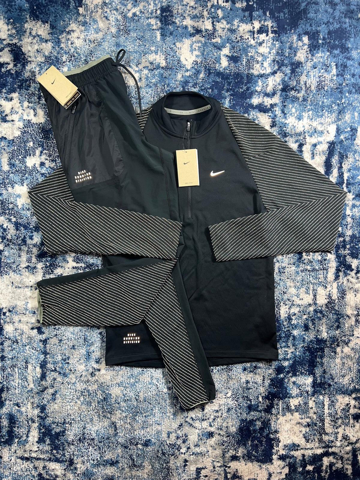 Nike Running Division Reflective 1/4 Zip & Bottoms Tracksuit Set Black in Black, men's Mixed Sizes – front view