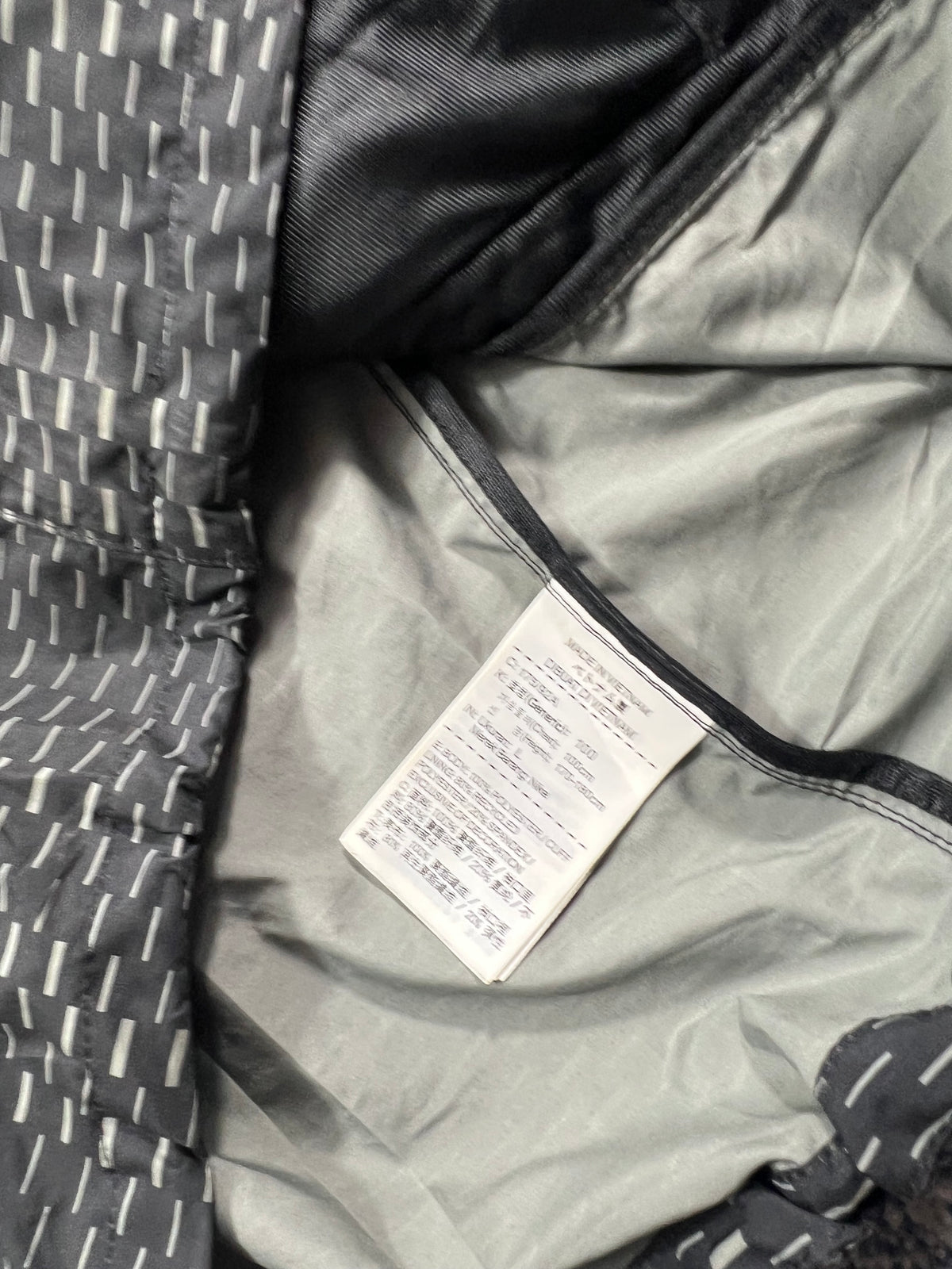 Nike Racer Fuse Digital Dash Windrunner Jacket Dark Grey Men’s Medium in Dark Grey, men's Medium – detail view