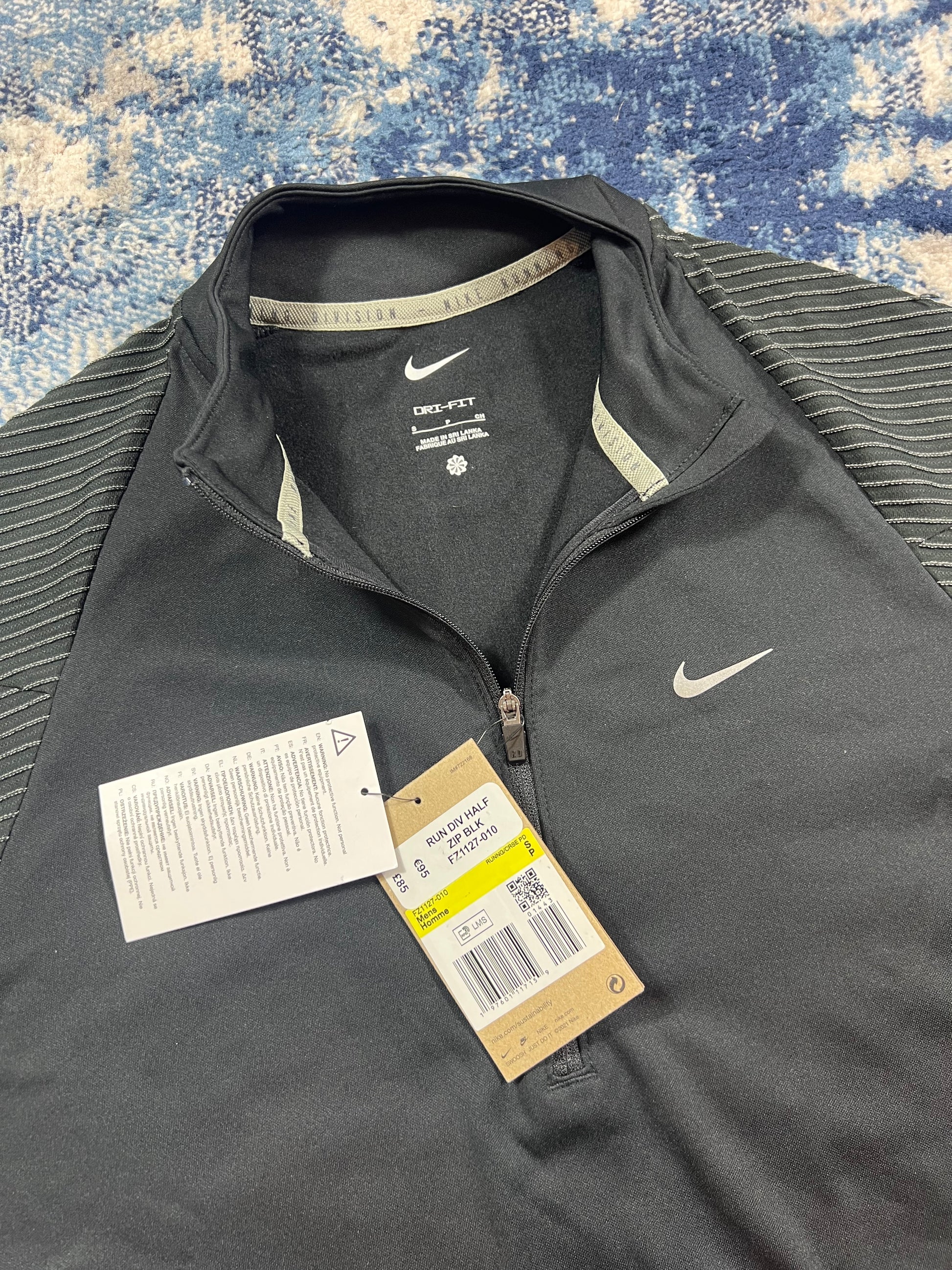 Nike Running Division Reflective 1/4 Zip & Bottoms Tracksuit Set Black in Black, men's Mixed Sizes – detail view