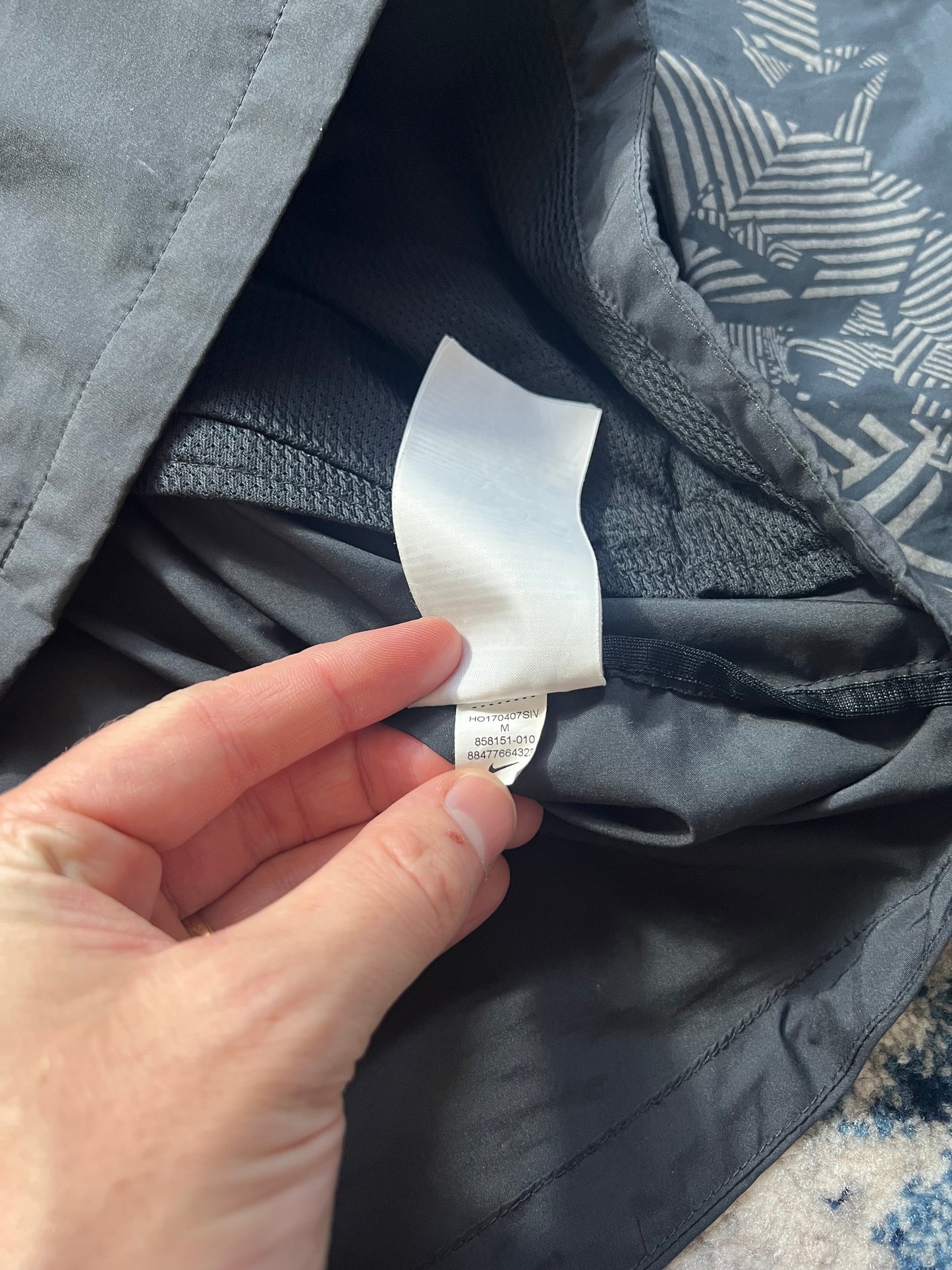 Nike Essentials Reflective Windrunner Jacket Men’s Medium in Reflective / Colour Not Provided, men's Medium – detail view