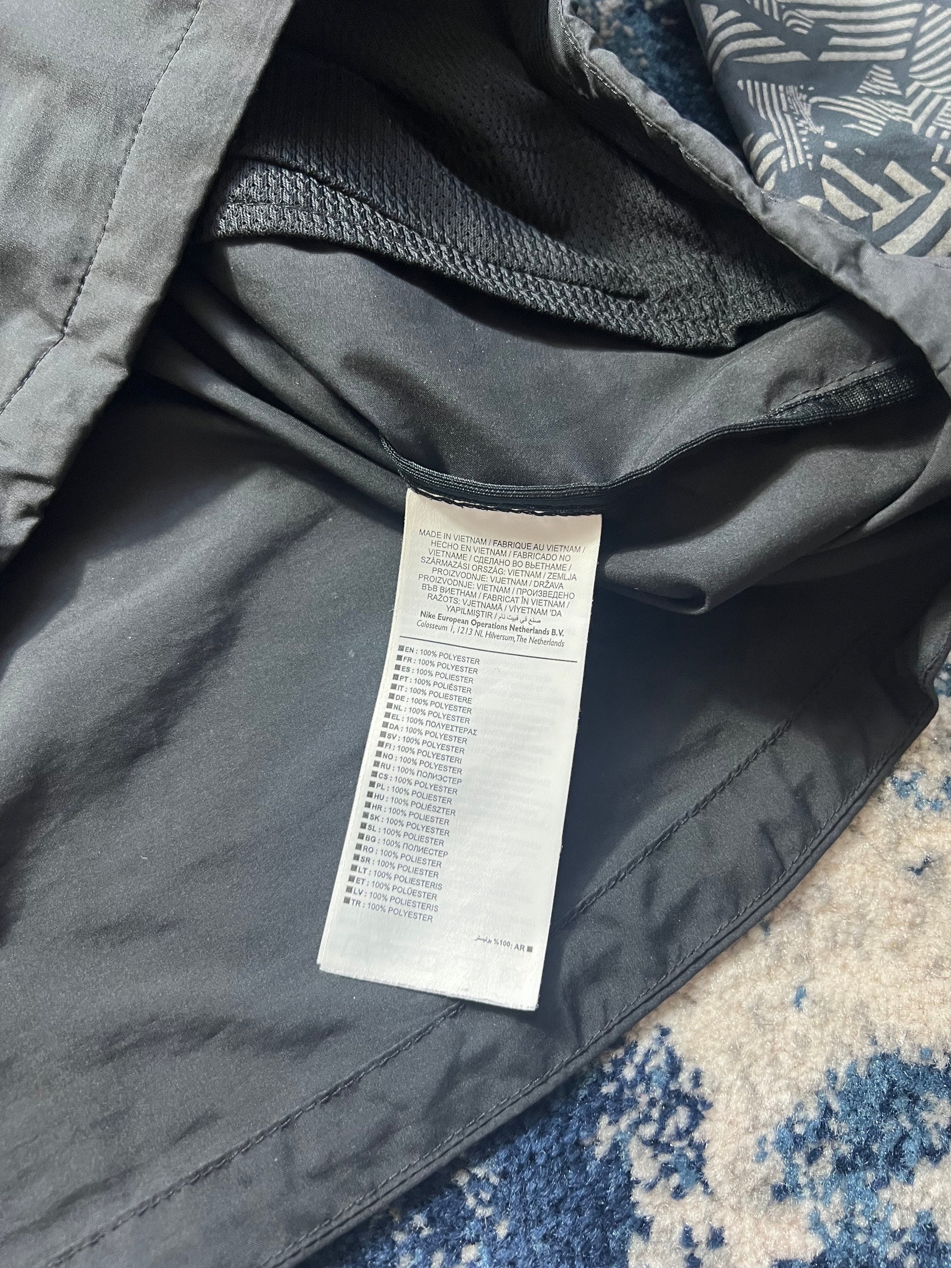 Nike Essentials Reflective Windrunner Jacket Men’s Medium in Reflective / Colour Not Provided, men's Medium – detail view