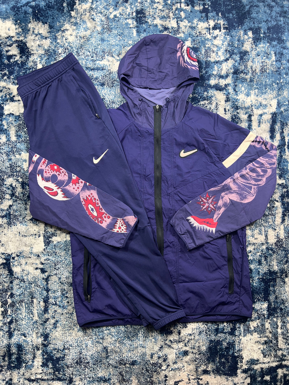 Nike Wild Run Purple Dragon Windrunner & Dri-FIT Bottoms Tracksuit Set – Purple / Multicolour in Purple / Multicolour…