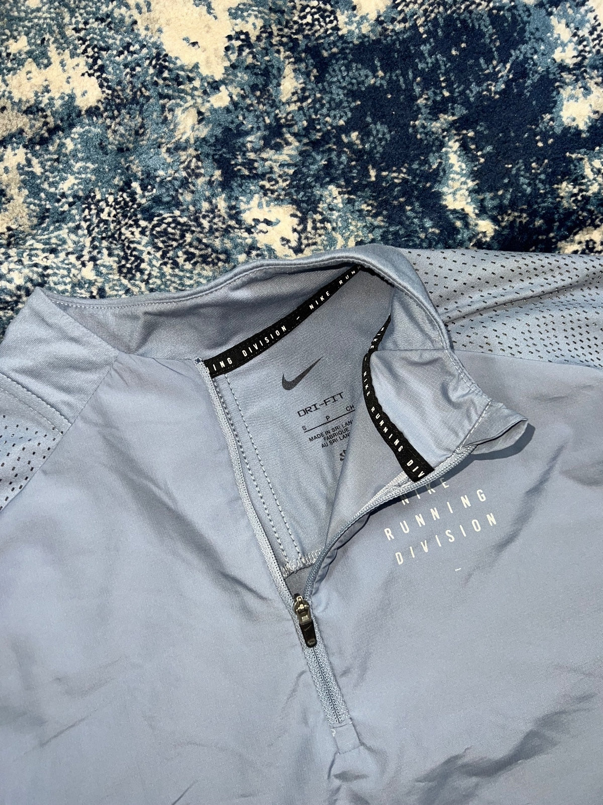 Nike Running Division Element 1/4 Zip – LightBlue, Men's Small in LightBlue, men's Small – detail view