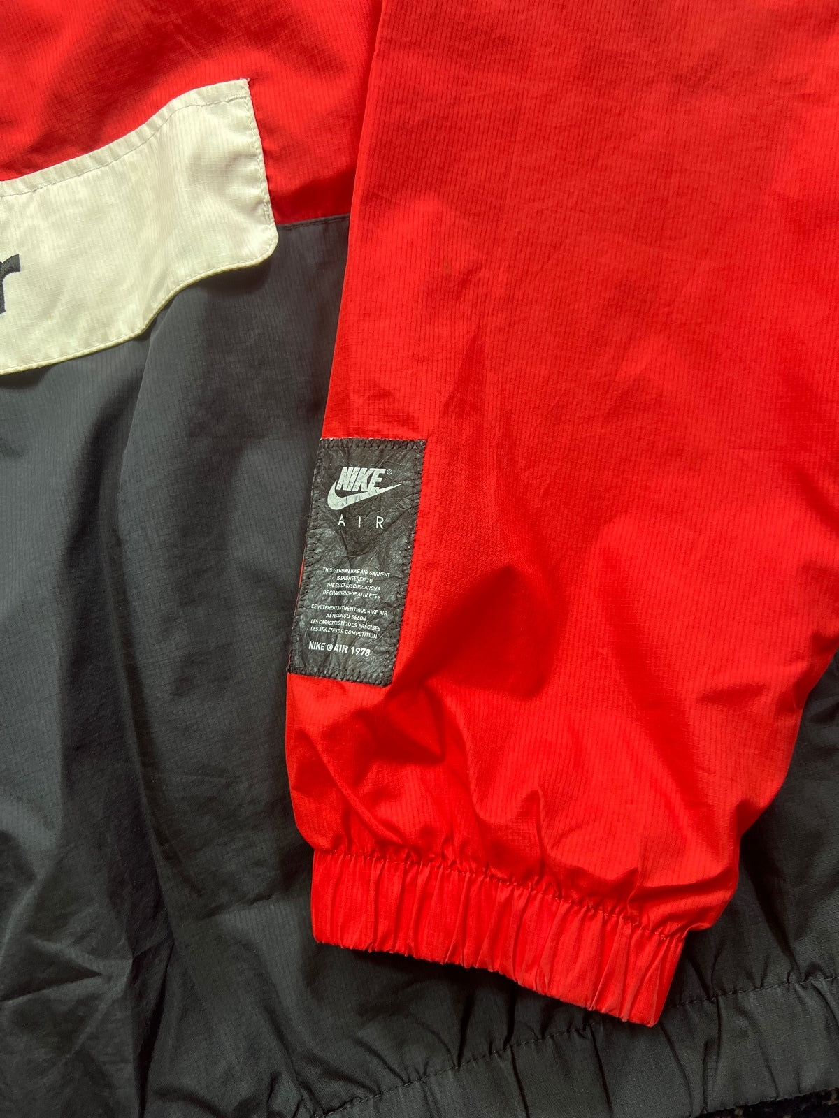 Nike Air ‘Dave’ 1/2 Zip Hoodie Woven Jacket – Red / Black, Men's Medium in Red / Black, men's Medium – detail view