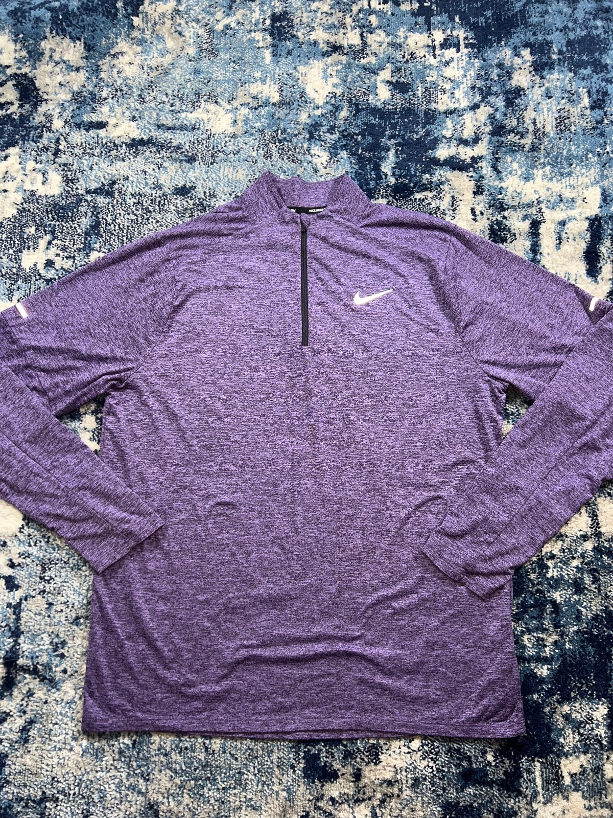 Nike Running Element 1/4 Zip – Purple, Men's Medium in Purple, men's Medium – detail view