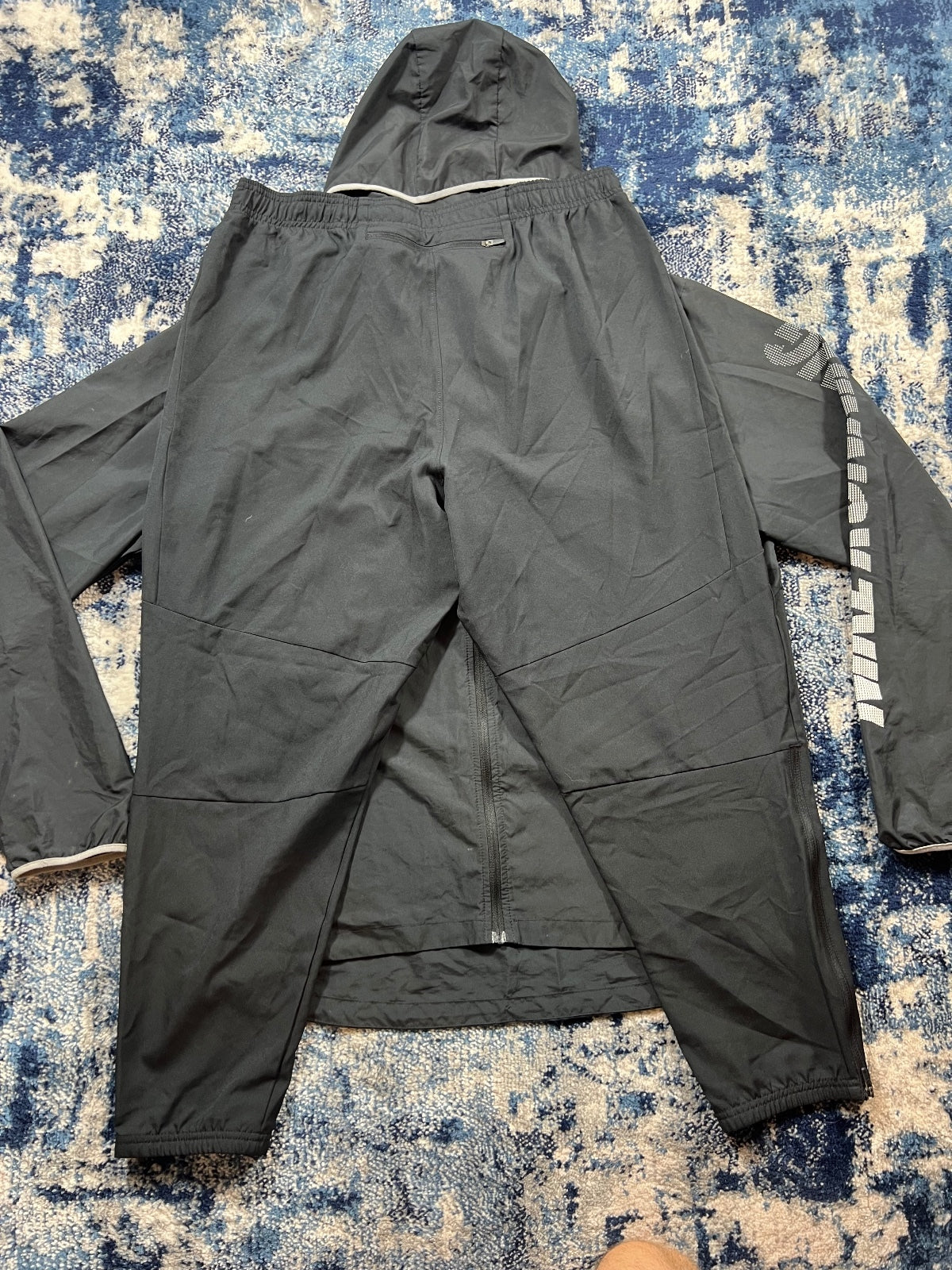 Nike Running Windrunner Jacket / Dri Fit Bottoms Tracksuit Set – Black, Men's Large in Black, men's Large – detail view