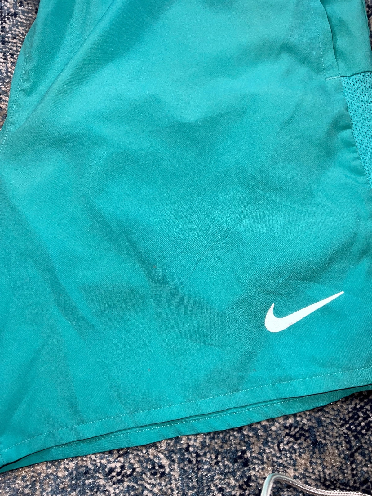 Nike Running Challenger 2 in 1 Shorts – Turquoise, Men's Medium in Turquoise, men's Medium – detail view