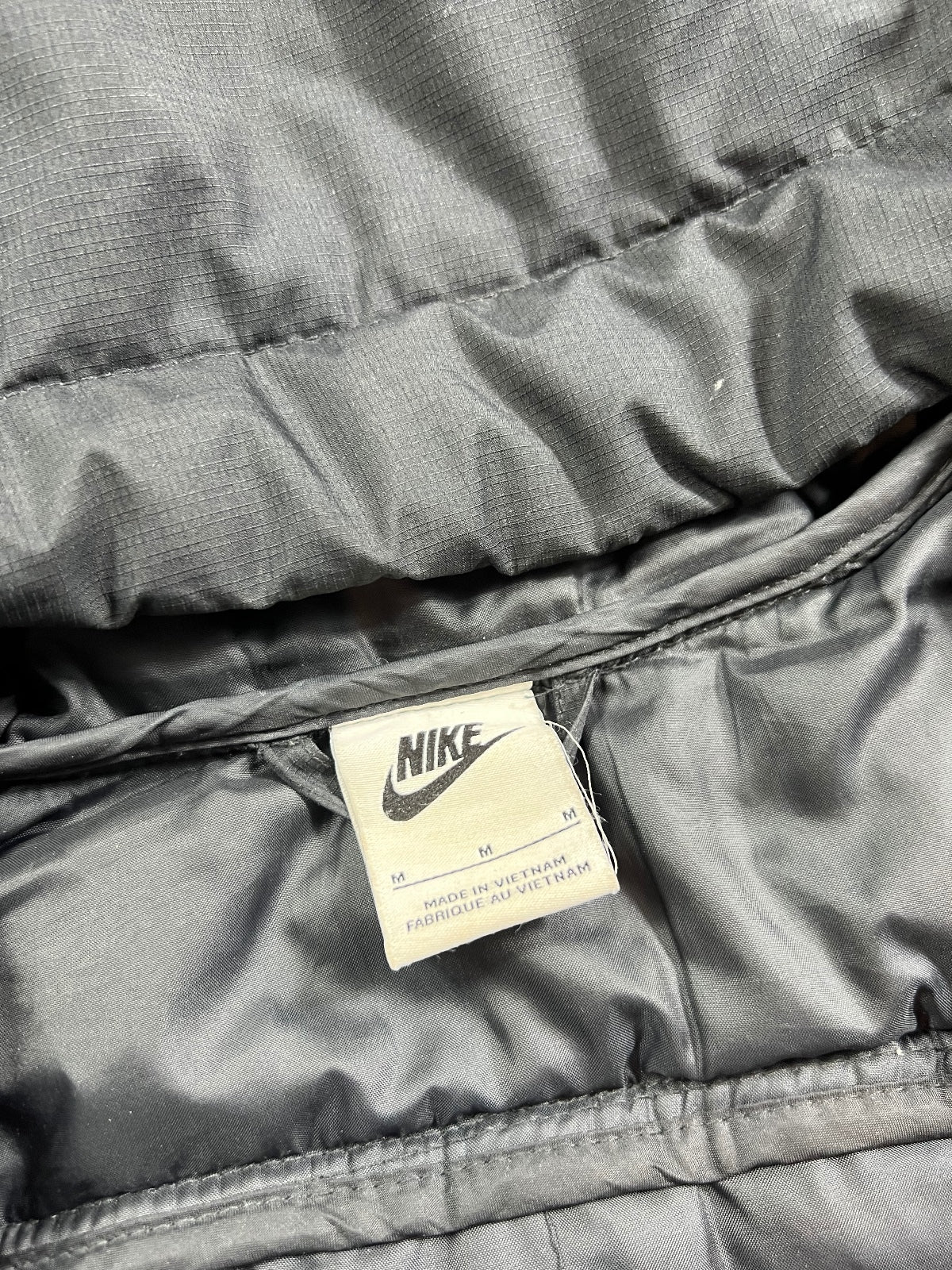 Nike Hybrid Puffer Coat Jacket – Black, Men's Medium in Black, men's Medium – detail view