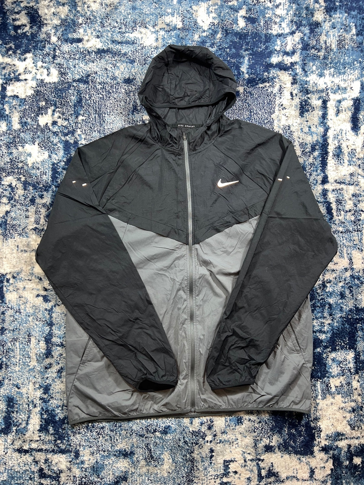 Nike Stride Dri Fit Windrunner Jacket – Black, Men's Large in Black, men's Large – front view