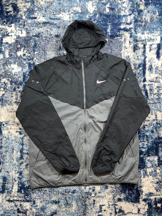 Nike Stride Dri Fit Windrunner Jacket – Black, Men's Large in Black, men's Large – front view