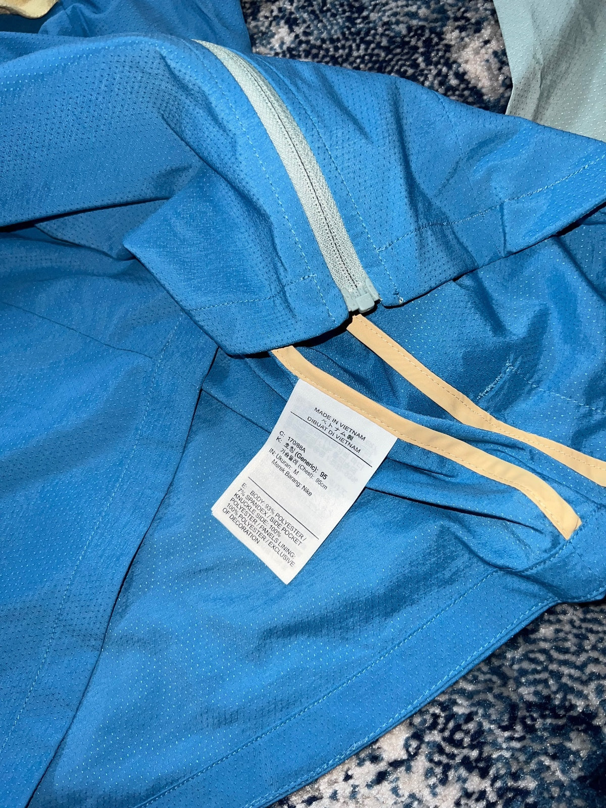 Nike Repel UV Packable Windrunner Jacket – Blue, Men's Medium in Blue, men's Medium – detail view
