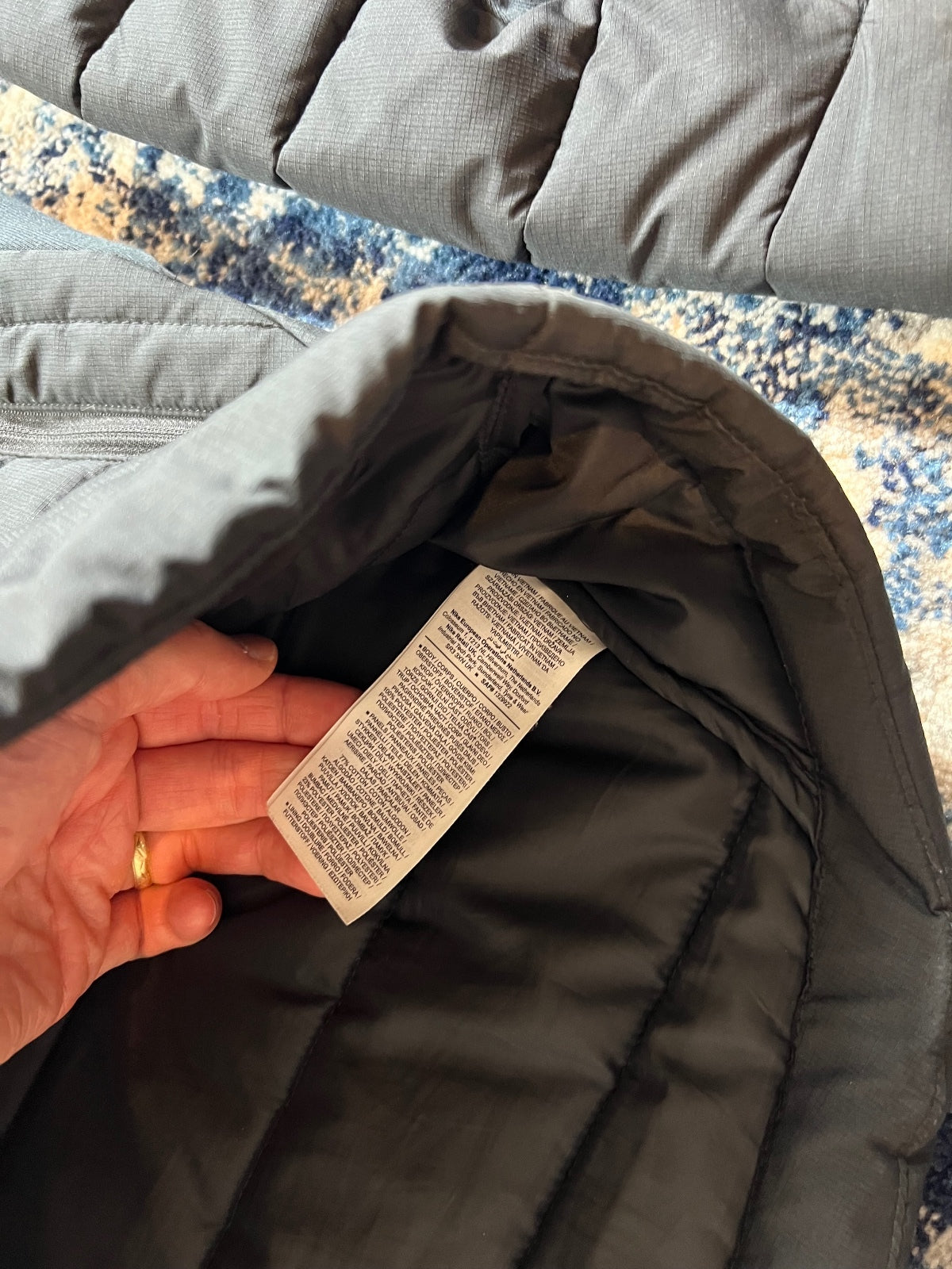 Nike Hybrid Puffer Coat Jacket – Black, Men's Medium in Black, men's Medium – detail view