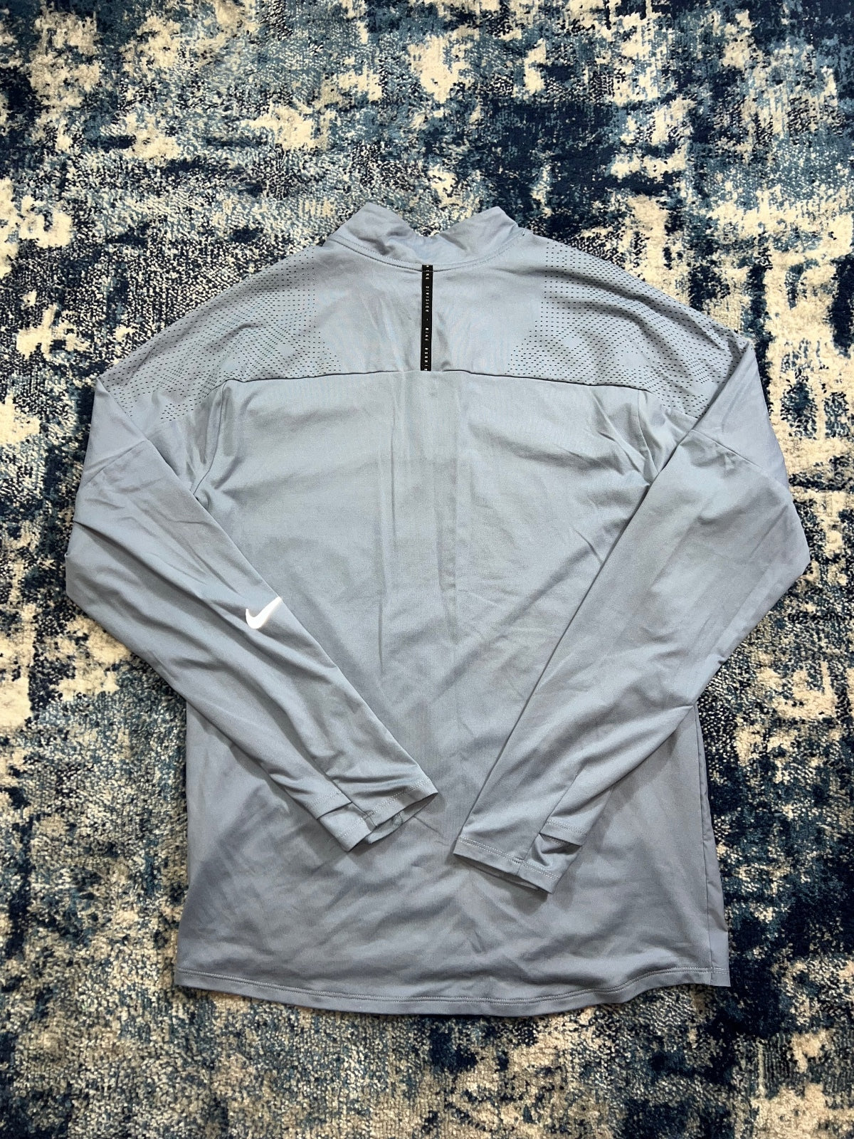 Nike Running Division Element 1/4 Zip – LightBlue, Men's Small in LightBlue, men's Small – detail view
