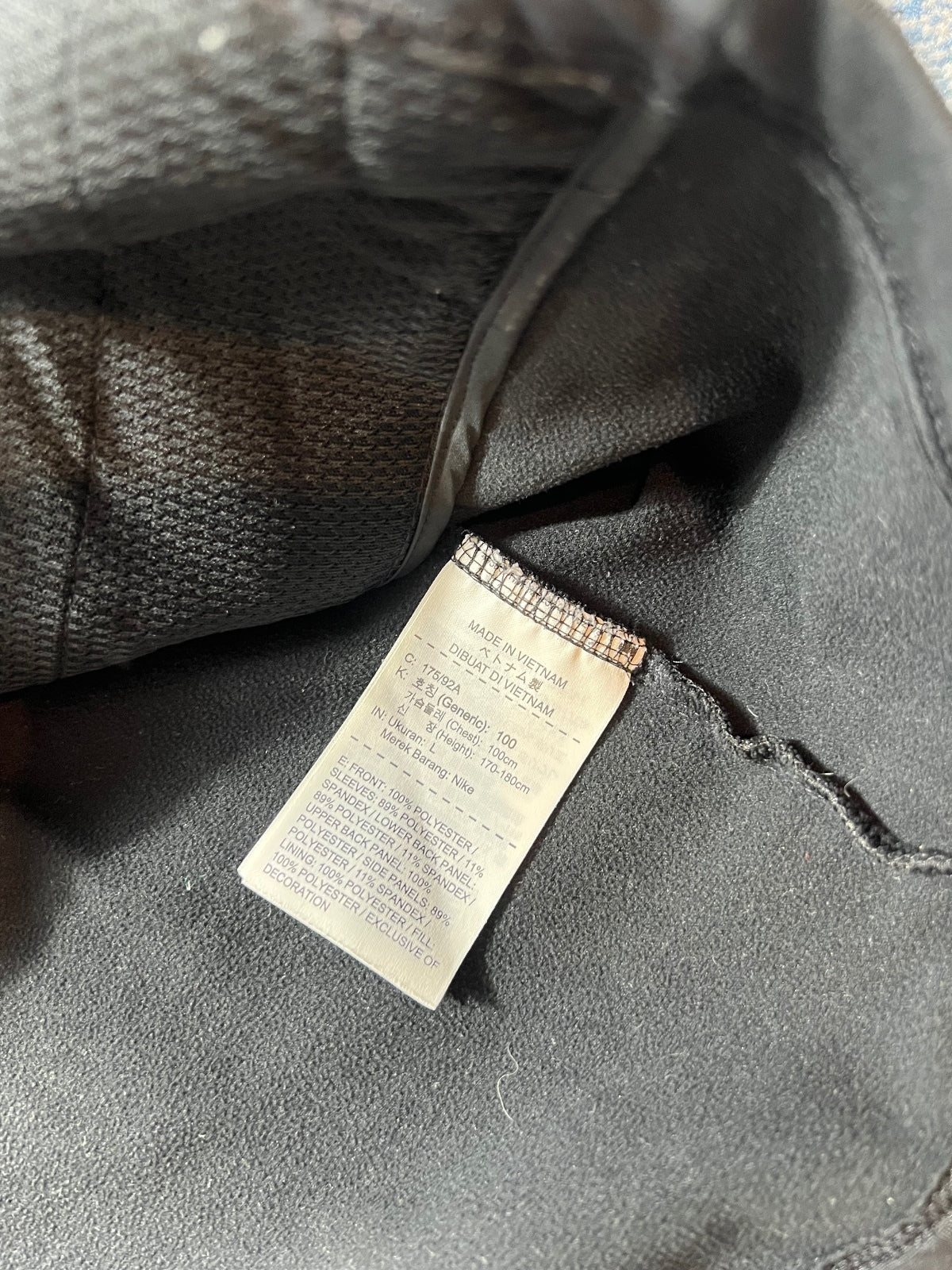 Nike Running Dri Fit Padded Jacket – Black, Men's Medium in Black, men's Medium – detail view