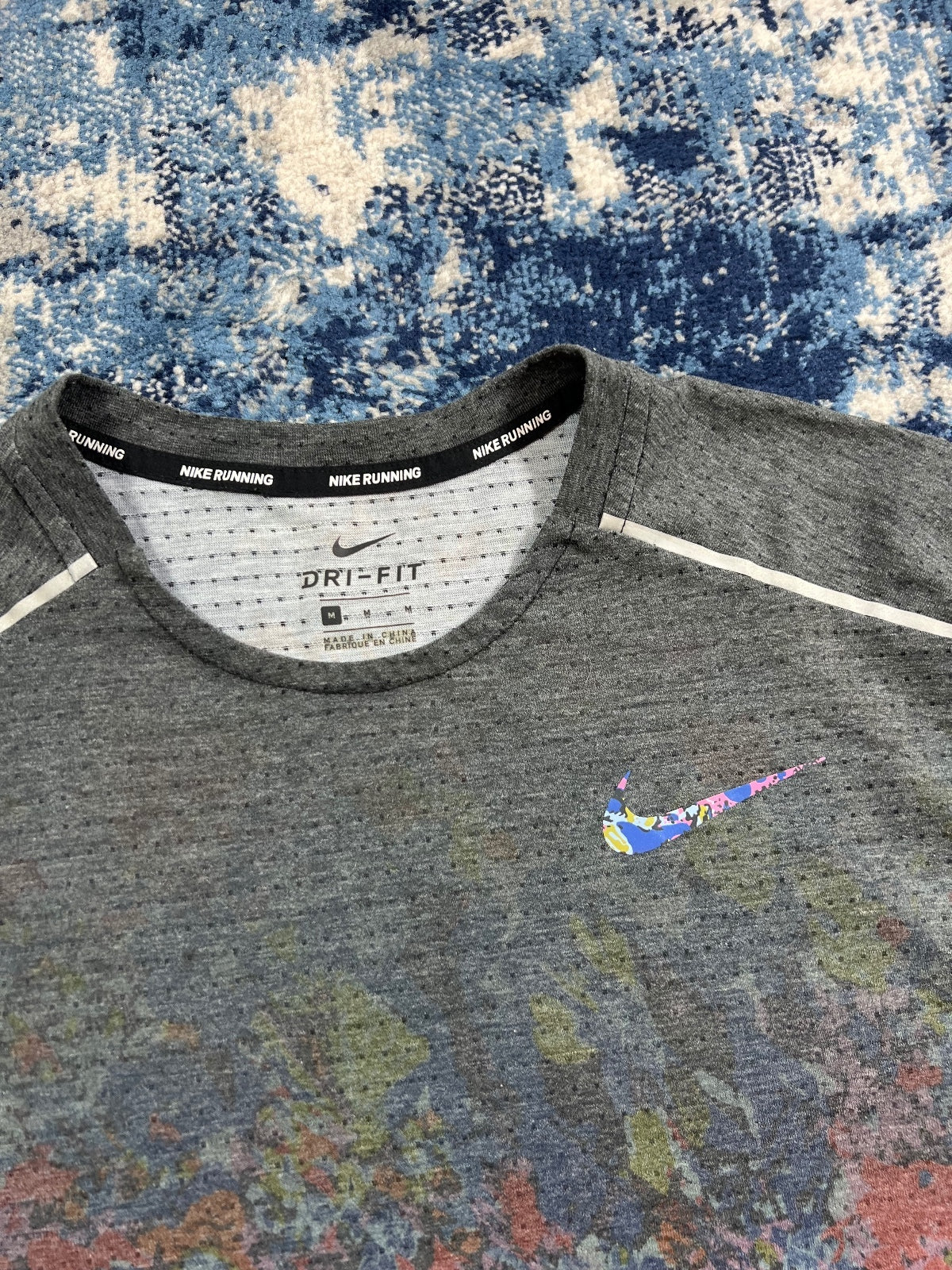 Nike Miler Running Dri Fit ‘Floral’ T Shirt – Multi, Men's Medium in Multi, men's Medium – detail view