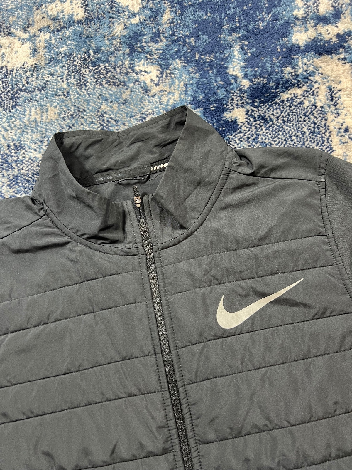 Nike Running Dri Fit Padded Jacket – Black, Men's Medium in Black, men's Medium – detail view
