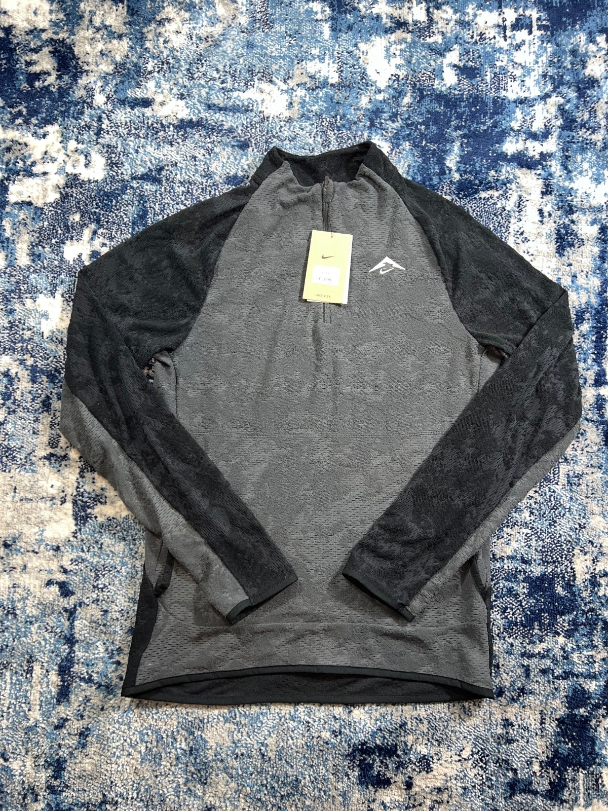 Nike Trail Dri Fit Running Fleece Top – Black, Men's Extra Small in Black, men's Extra Small – front view