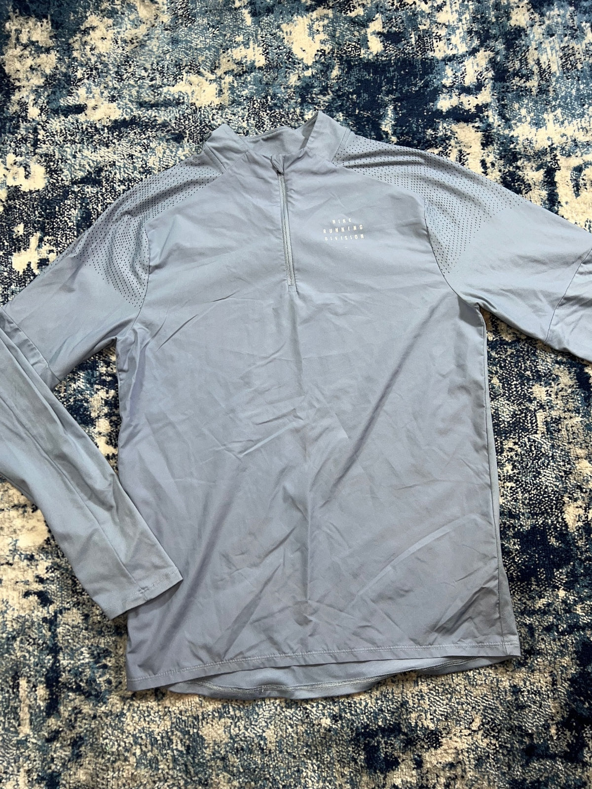 Nike Running Division Element 1/4 Zip – LightBlue, Men's Small in LightBlue, men's Small – detail view