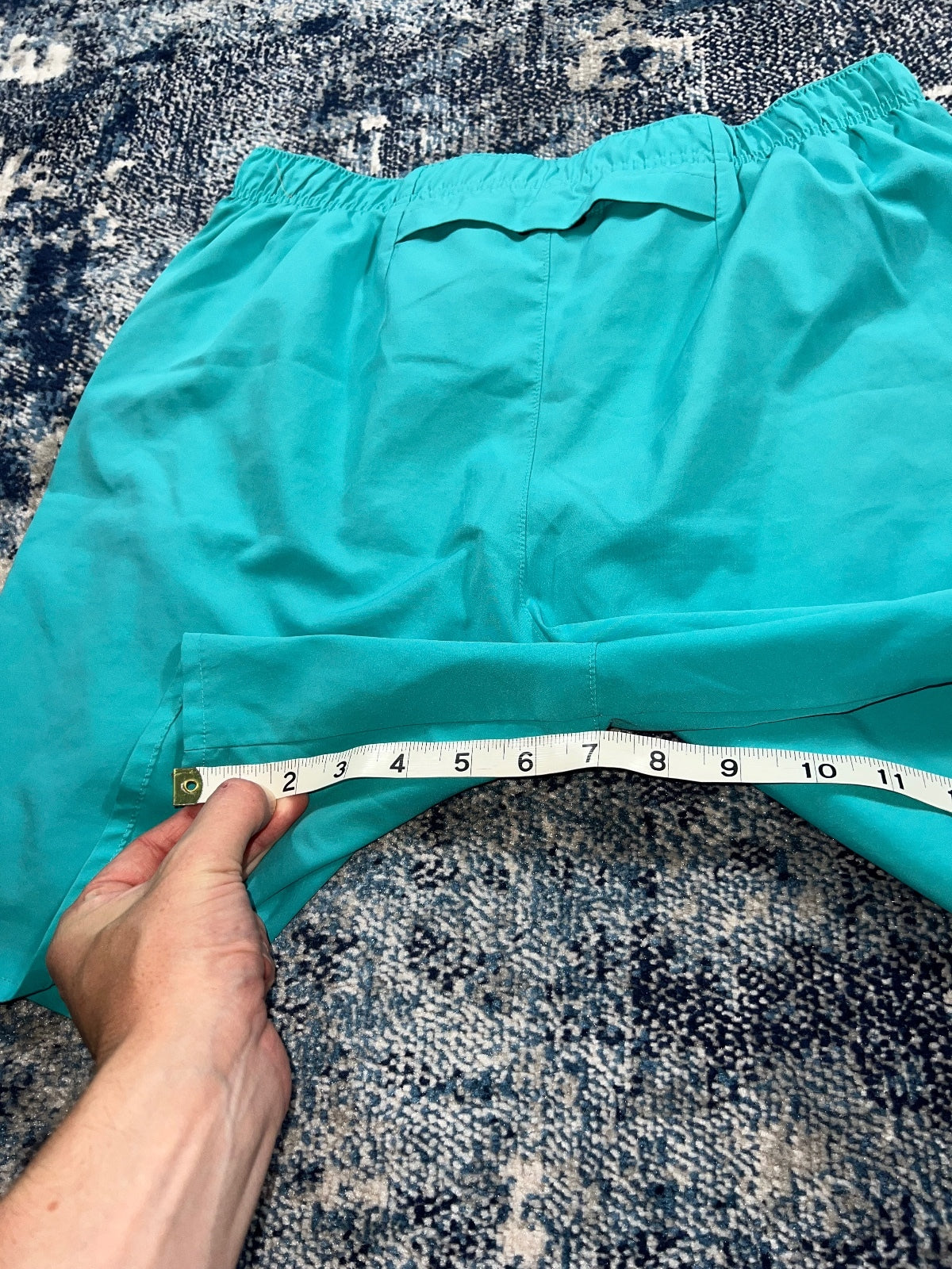 Nike Running Challenger 2 in 1 Shorts – Turquoise, Men's Medium in Turquoise, men's Medium – detail view