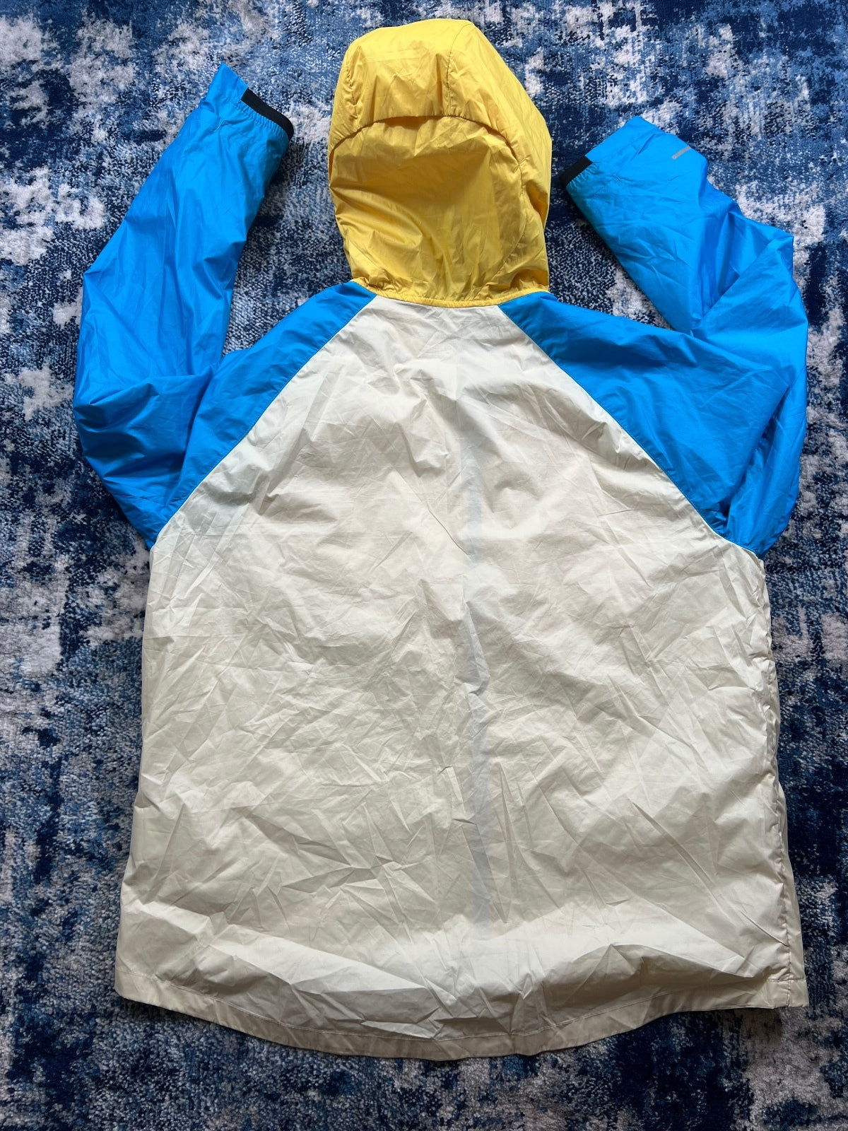 Nike Trail Storm Fit Windrunner Jacket – Yellow / Blue, Men's XL in Yellow / Blue, men's XL – detail view