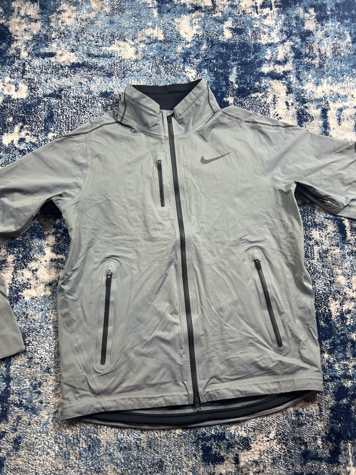 Nike Technical Shield Running Dri Fit Windrunner Jacket – Silver, Men's Extra Small in Silver, men's Extra Small – detail…