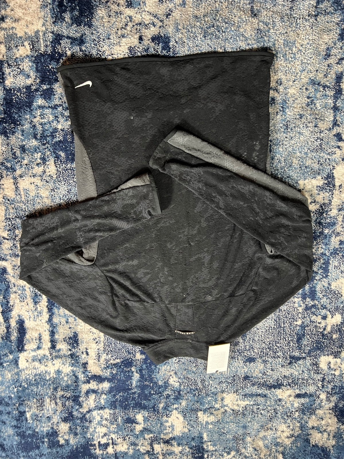Nike Trail Dri Fit Running Fleece Top – Black, Men's Extra Small in Black, men's Extra Small – detail view