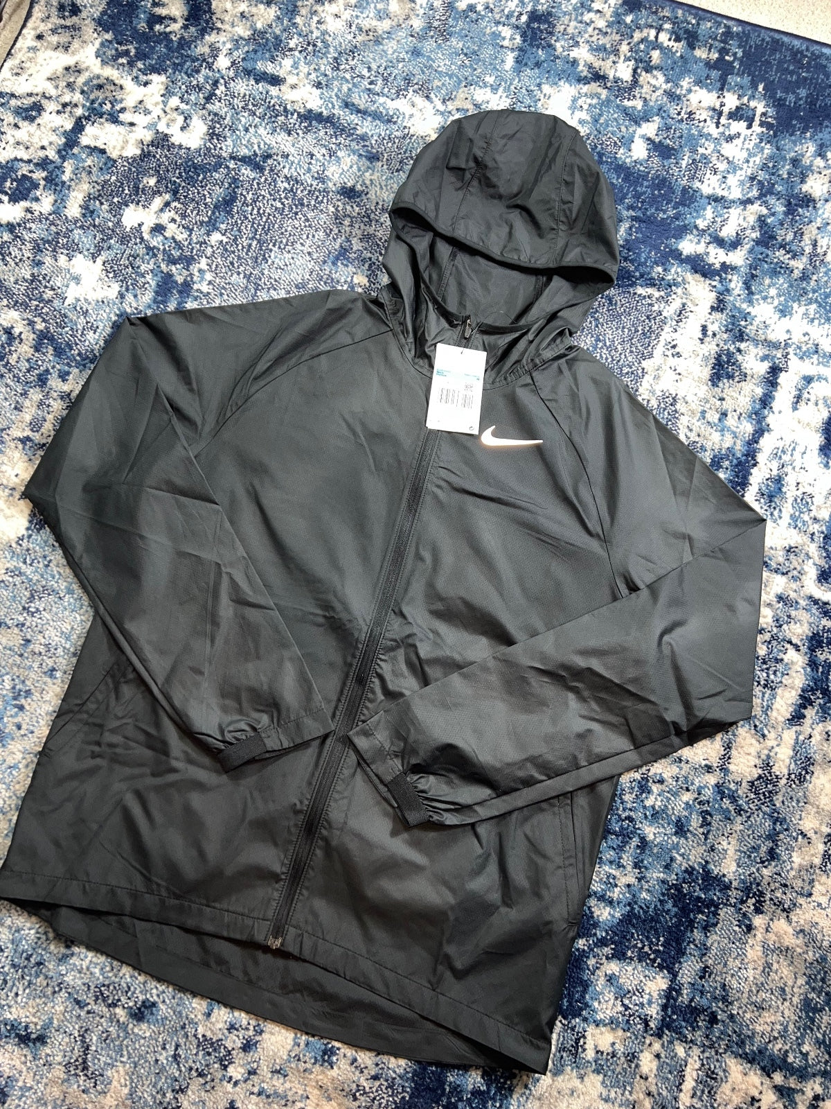 Nike Essentials Dri Fit Windrunner Jacket – Black, Men's Medium in Black, men's Medium – detail view