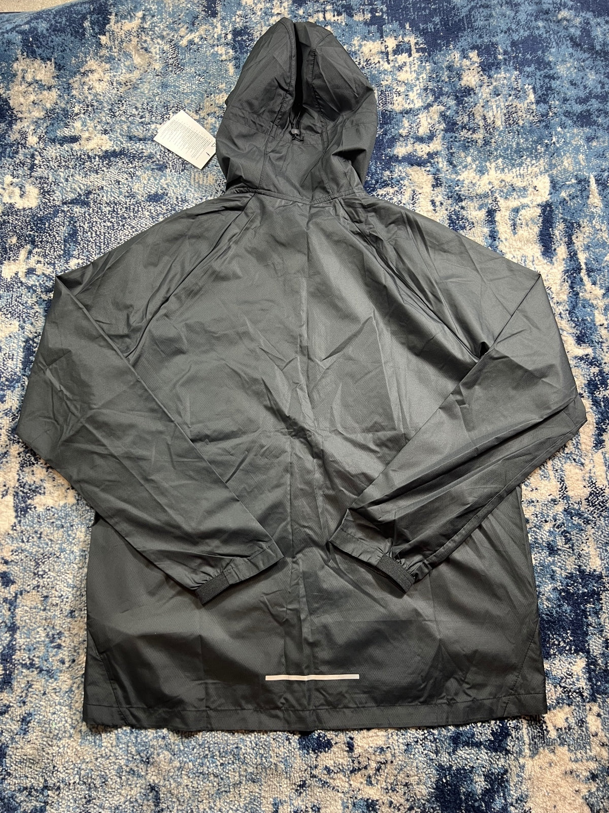 Nike Essentials Dri Fit Windrunner Jacket – Black, Men's Large in Black, men's Large – detail view